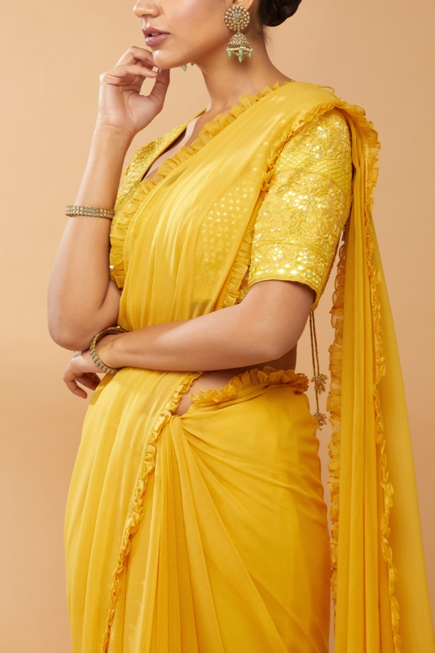 Plain yellow saree with designer blouse discount