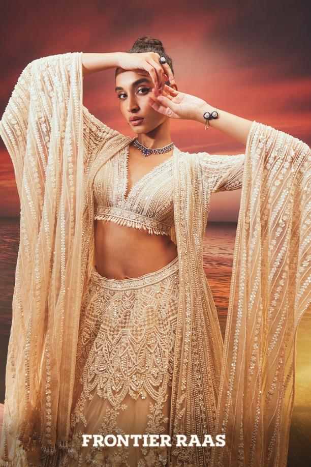 Ivory net Jacket Lehenga