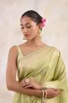 Muted Olive Green Tissue Silk Saree