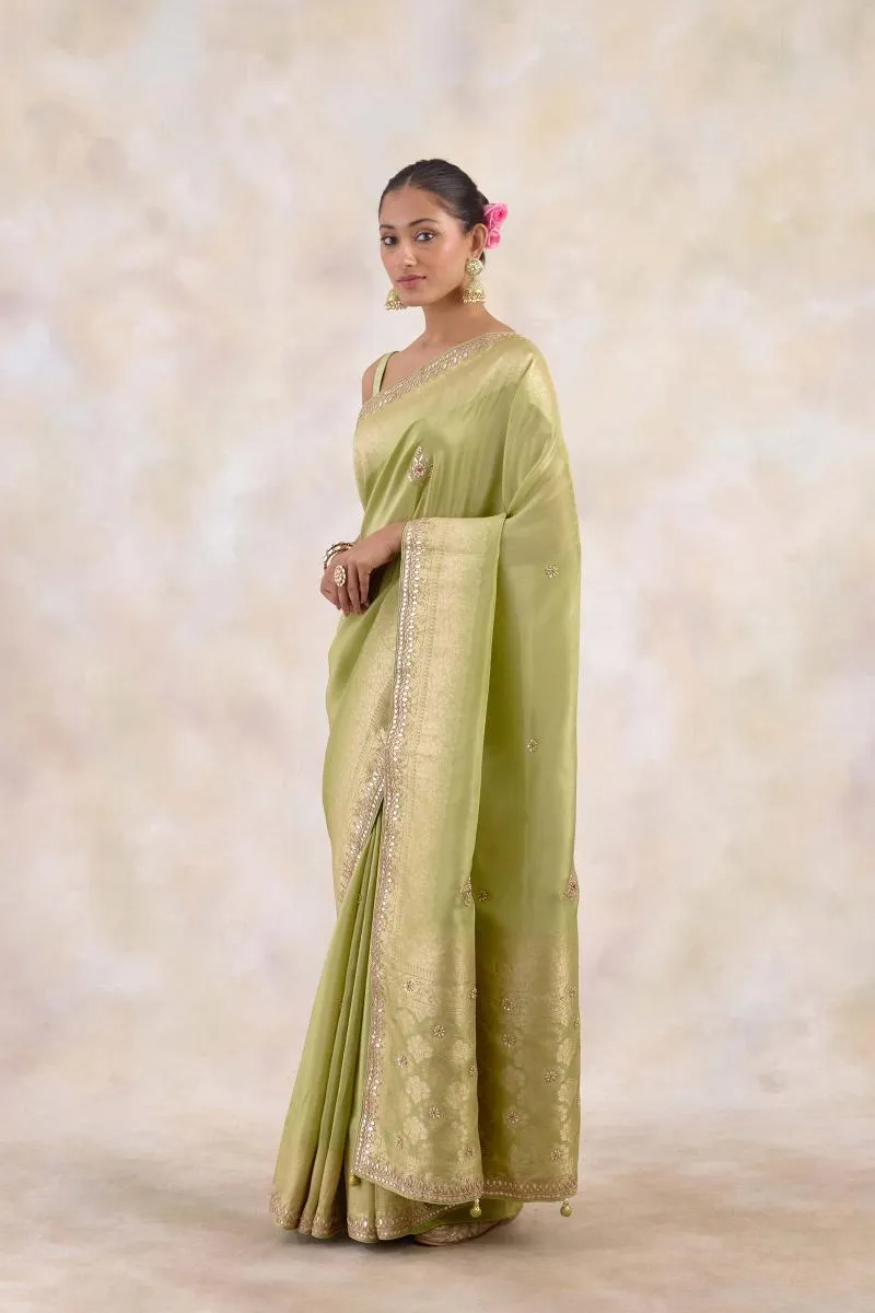 Muted Olive Green Tissue Silk Saree