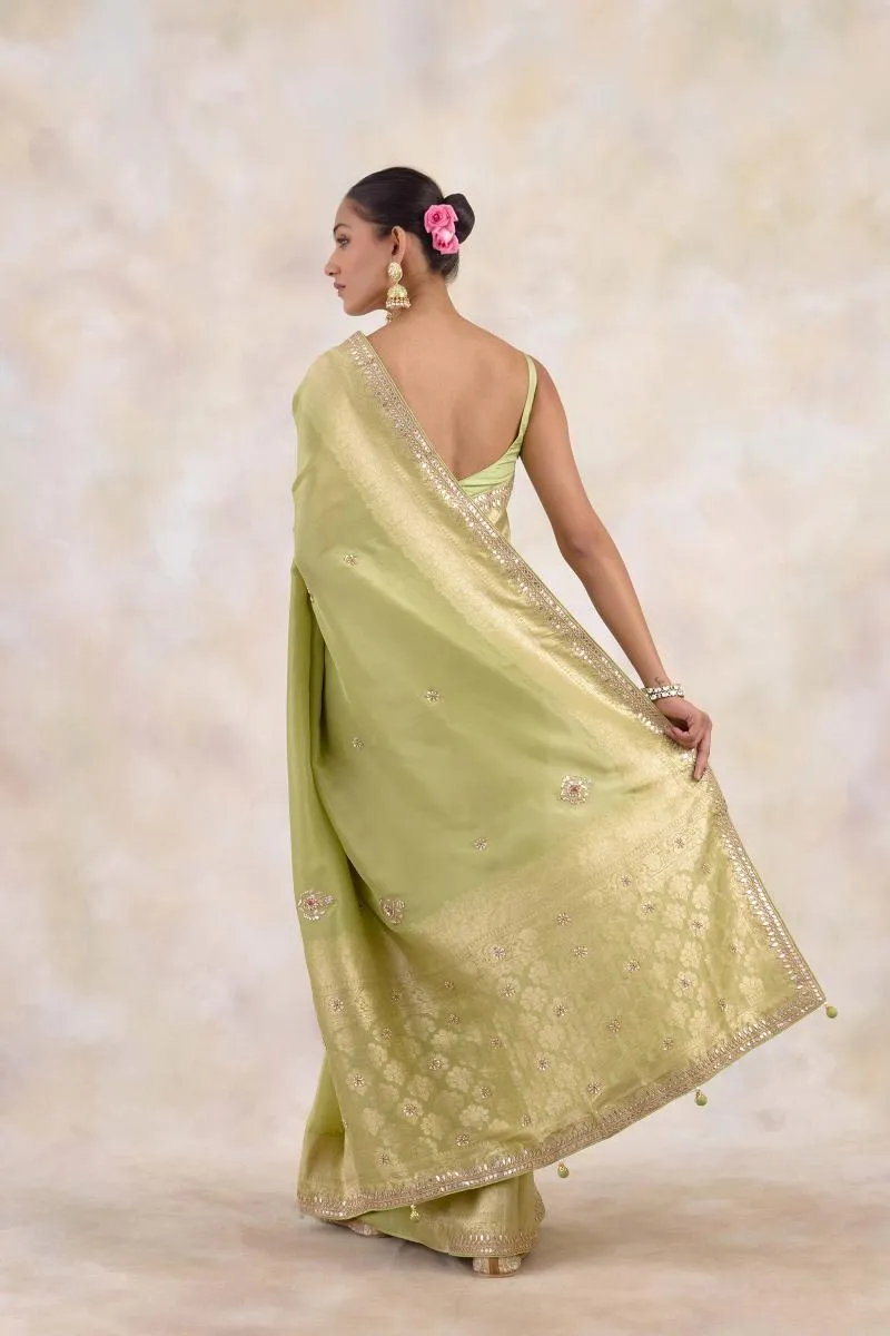 Muted Olive Green Tissue Silk Saree